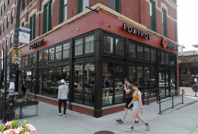 <p>John J. Kim / Chicago Tribune / Tribune News Service via Getty Images</p> Long before the pandemic forced grocers to embrace options beyond in-person shopping, Foxtrot promised Chicagoans 30-minute delivery of wine, craft beer, gifts, and pantry items.