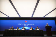 Song Liuping, third from left, chief legal officer of Huawei, speaks during a press conference at Huawei's campus in Shenzhen in southern China's Guandong Province, Thursday, Dec. 5, 2019. Chinese tech giant Huawei is asking a U.S. federal court to throw out a rule that bars rural phone carriers from using government money to purchase its equipment on security grounds. (AP Photo/Mark Schiefelbein)