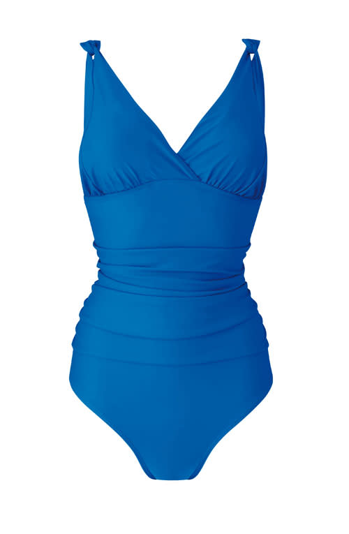 <b>Apple shape</b><br><br>The apple body's best friend is tummy control, so look for swimsuits with hidden support bands for subtle concealment. <br><br><a href="http://www.fiftyplus.co.uk/shop/slimma-swimsuit-standard-length/ro146/product/details/show.action?pdBoUid=5170#colour:AZURE%20BLUE,size:" rel="nofollow noopener" target="_blank" data-ylk="slk:Fifty Plus;elm:context_link;itc:0;sec:content-canvas" class="link ">Fifty Plus</a> tummy tuck blue swimsuit, £45