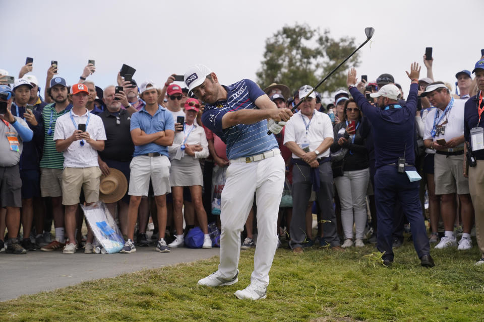 Louis Oosthuizen, of South Africa, hits from the 14th fairway rough during the final round of the U.S. Open Golf Championship, Sunday, June 20, 2021, at Torrey Pines Golf Course in San Diego. (AP Photo/Jae C. Hong)