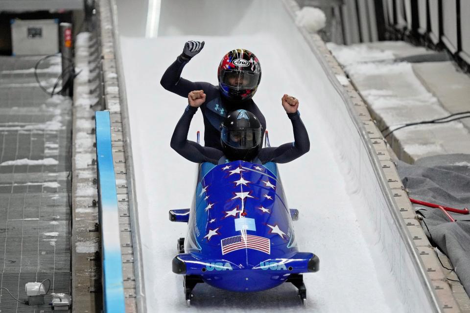 Elana Meyers Taylor and Sylvia Hoffman (USA) react after their run in the two-man bobsled. They won bronze.