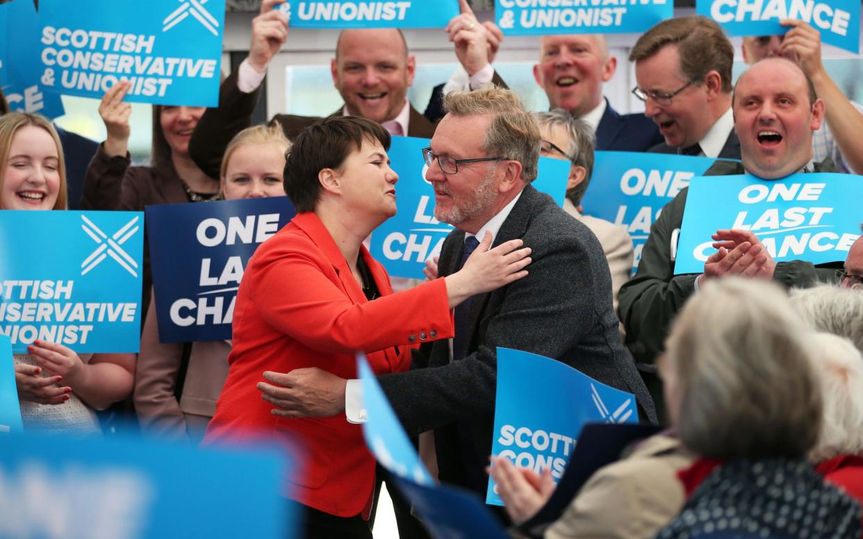 Scottish Conservative party leader Ruth Davidson embraces Scotland Secretary David Mundell during an event at the Glasshouse Hotel in Edinburgh while on the last full day of campaigning for the General Election - PA