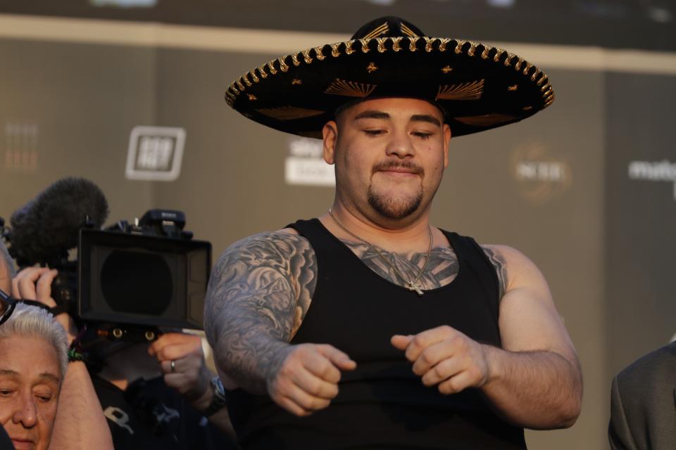 Heavyweight boxer Andy Ruiz Jr. of Mexico poses during a weigh-in at Faisaliah Center, in Riyadh, Saudi Arabia, Friday, Dec. 6, 2019. The first ever heavyweight title fight in the Middle East, has been called the "Clash on the Dunes." Will take place at the Diriyah Arena on Saturday. (AP Photo/Hassan Ammar)