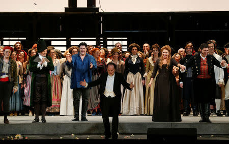 Director Riccardo Chailly and the cast acknowledges the applause at the end of the "Andrea Chenier" by Umberto Giordano which opened the 2017-18 season at Milan's La Scala opera house, Italy December 7, 2017. REUTERS/Stefano Rellandini