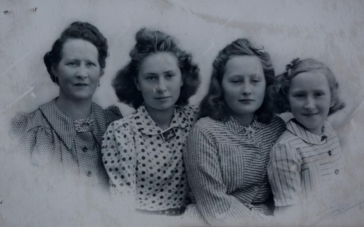 Collect photograph dated 1944 showing (left to right): Nell Sarginson and her three daughters Marie, Irene, and Jeanne