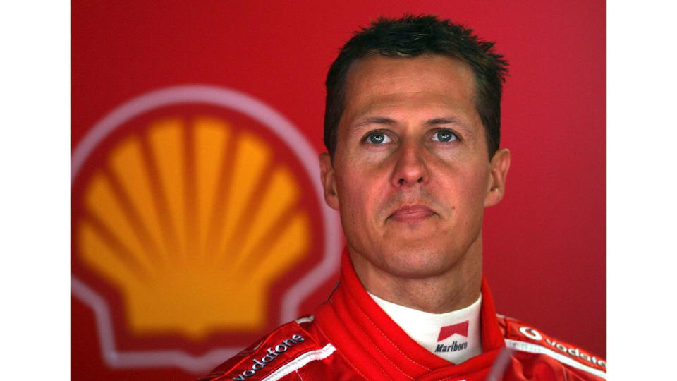 Michael Schumacher of Germany and Ferrari looks on in the Ferrari pit during the qualifying session for the Monaco Formula One Grand Prix on May 22, 2005 in Monte Carlo, Monaco