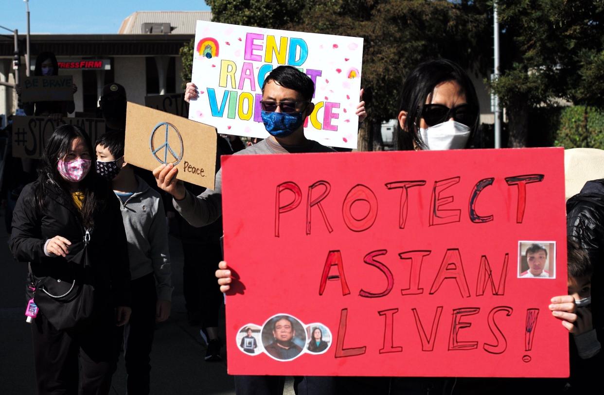 Demonstrators rally against anti-Asian hate crimes in San Mateo, California, on Feb. 27. (Photo: Xinhua News Agency/Getty Images)
