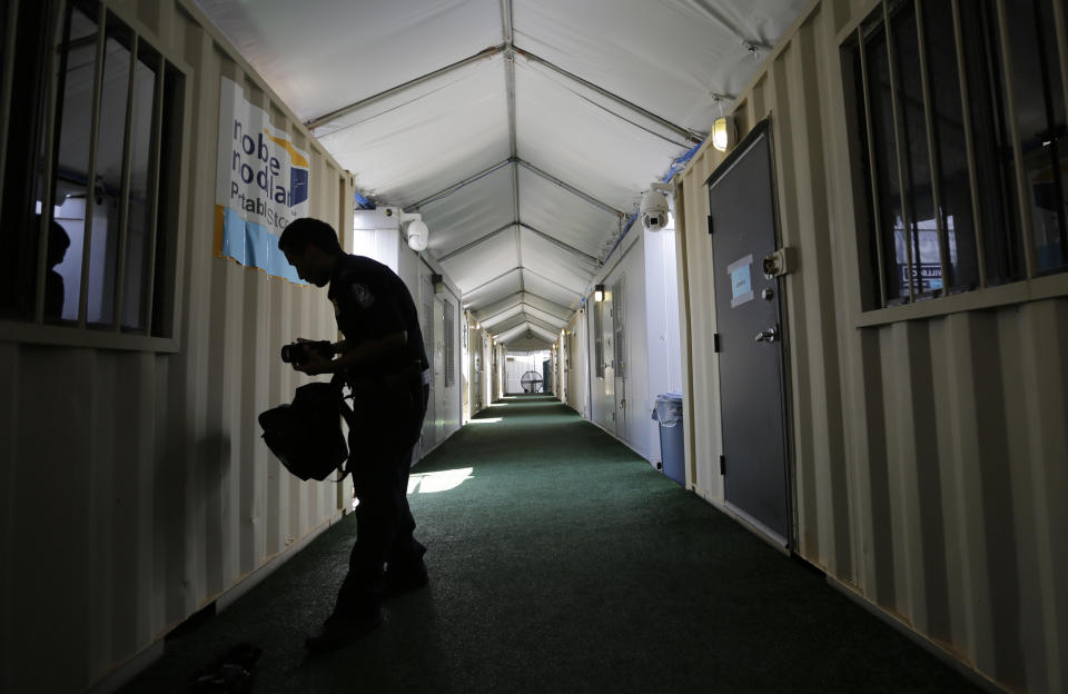 Pods are lined up and used as interview rooms at a new tent courtroom at the Migration Protection Protocols Immigration Hearing Facility, Tuesday, Sept. 17, 2019, in Laredo, Texas. (AP Photo/Eric Gay)