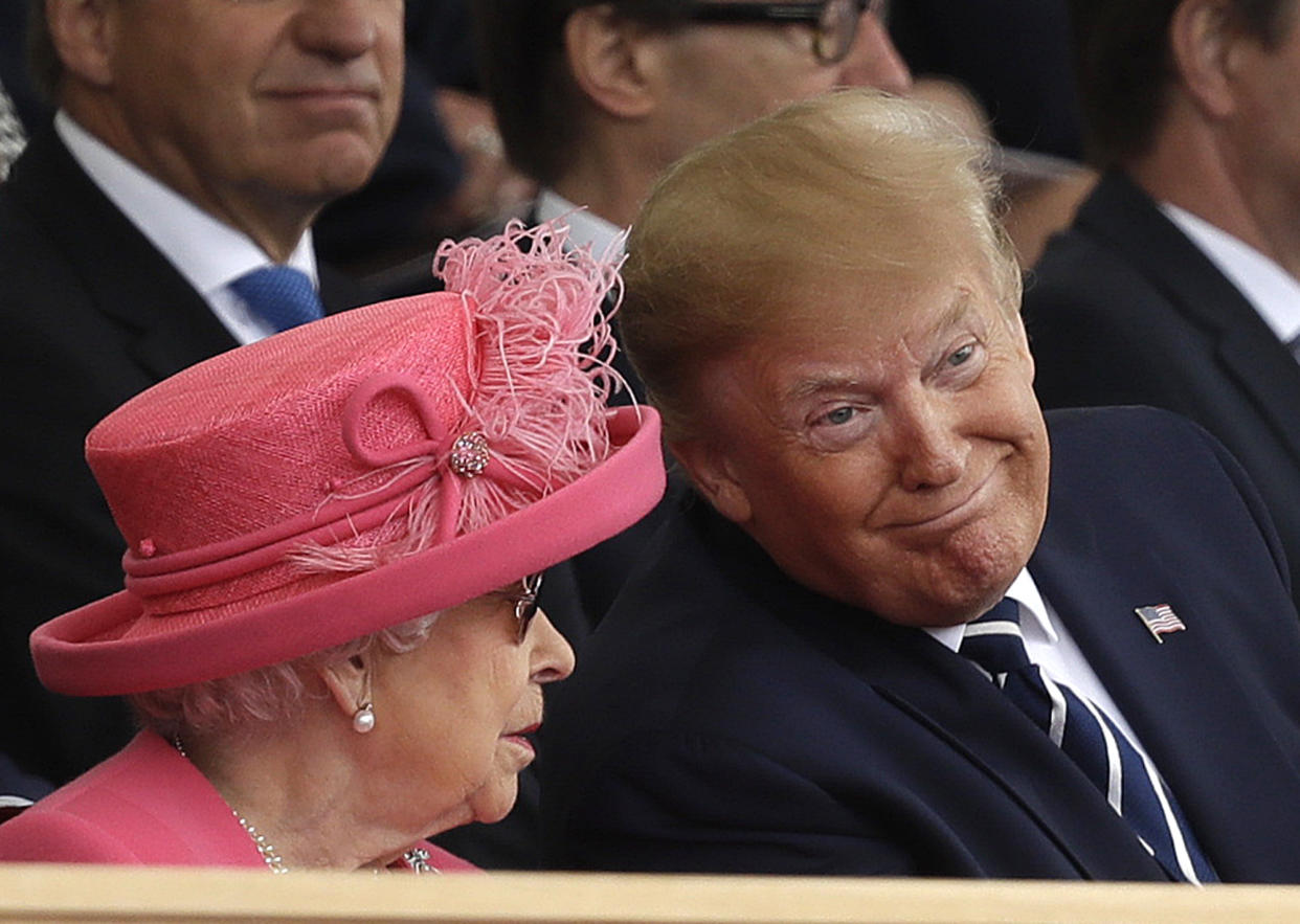 Queen Elizabeth II speaks with President Donald Trump during an event to mark the 75th anniversary of D-Day in Portsmouth, England Wednesday, June 5, 2019. World leaders including U.S. President Donald Trump are gathering Wednesday on the south coast of England to mark the 75th anniversary of the D-Day landings. (AP Photo/Matt Dunham)