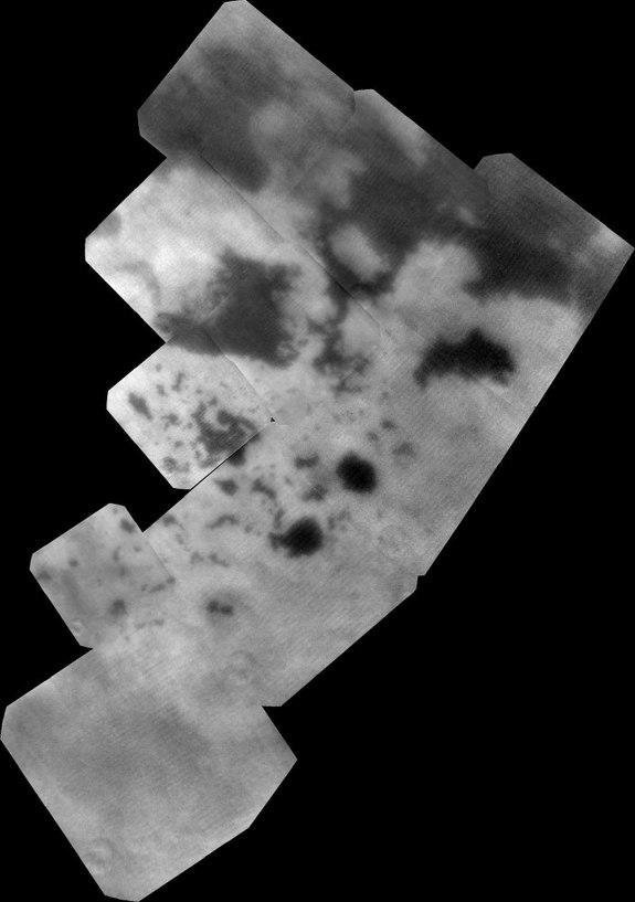 The vast hydrocarbon seas and lakes (dark shapes) near the north pole of Saturn's moon Titan sprawl out beneath the watchful eye of NASA's Cassini spacecraft. Image released Oct. 23, 2013.