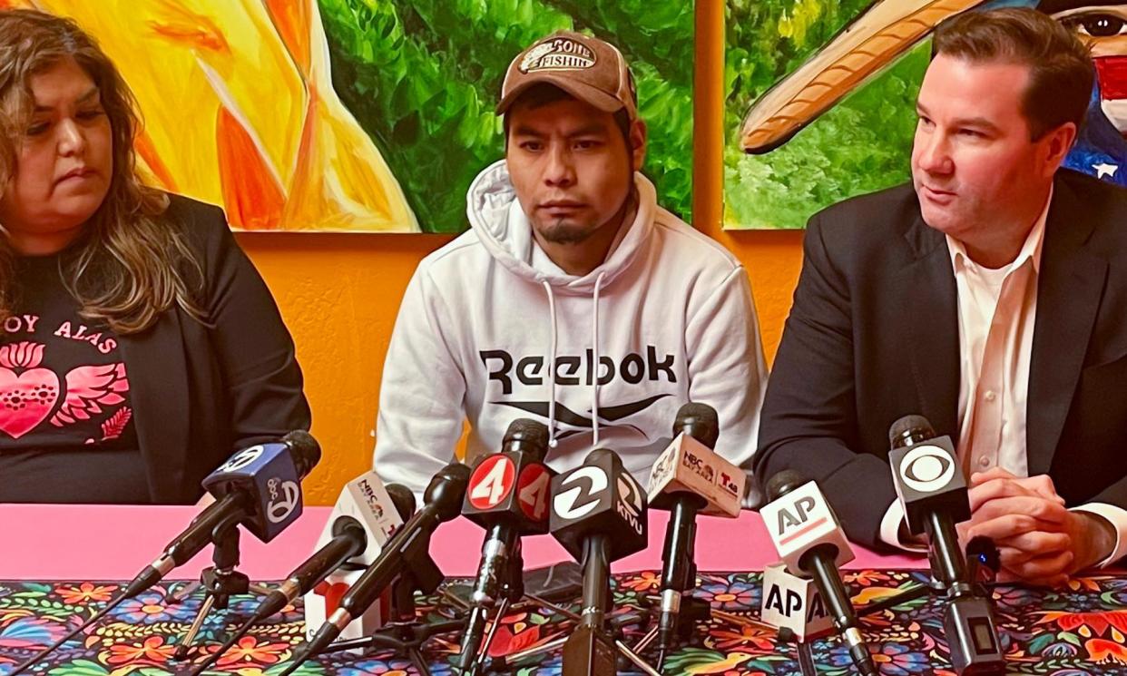 <span>Pedro Romero Perez, center, next to his attorney Donald Magilligan, right, in Half Moon Bay, California, on 5 April 2024.</span><span>Photograph: Haven Daley/AP</span>