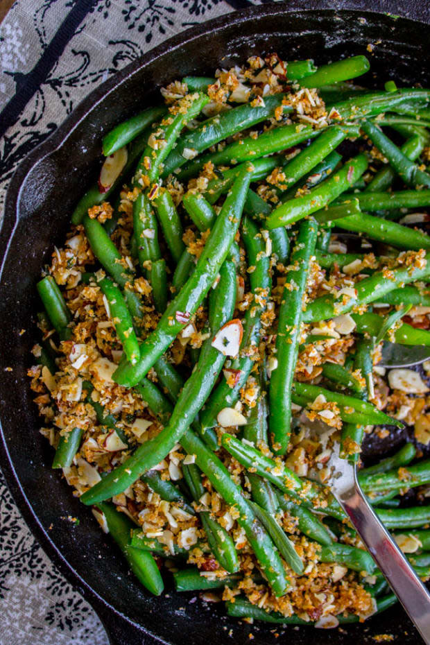 <p><strong>Get the recipe: <a href="https://thefoodcharlatan.com/make-ahead-green-beans-recipe/" rel="nofollow noopener" target="_blank" data-ylk="slk:Make-Ahead Green Beans with Garlic Breadcrumbs and Almonds;elm:context_link;itc:0;sec:content-canvas" class="link ">Make-Ahead Green Beans with Garlic Breadcrumbs and Almonds</a></strong></p><p>The Food Charlatan</p>