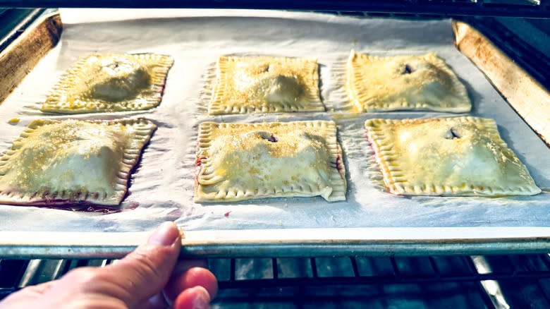 hand pies going into oven