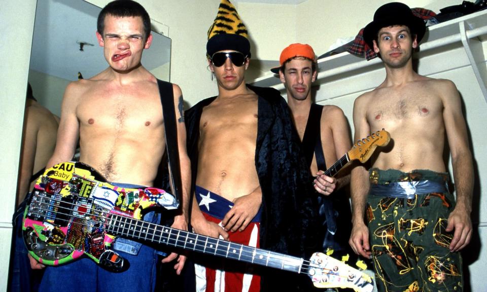 <span>The Red Hot Chili Peppers pose for a group portrait in 1984. The band’s songs are in the Hipgnosis stable of back catalogues.</span><span>Photograph: Joel Selvin/Getty Images</span>