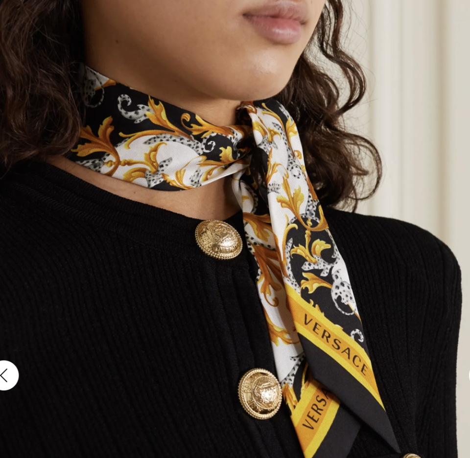 VERSACE Printed silk-twill scarf. PHOTO: Net-a-porter