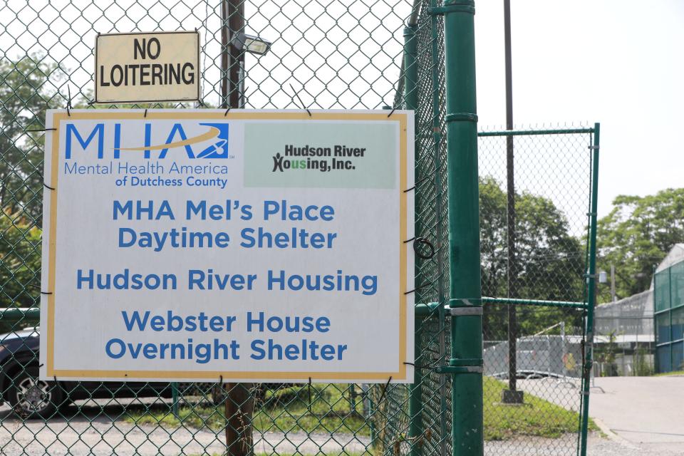 Signs indicating where Mental Health America and Hudson River Housing have a temporary homeless shelter located at the Dutchess County Jail on June 29, 2023. 