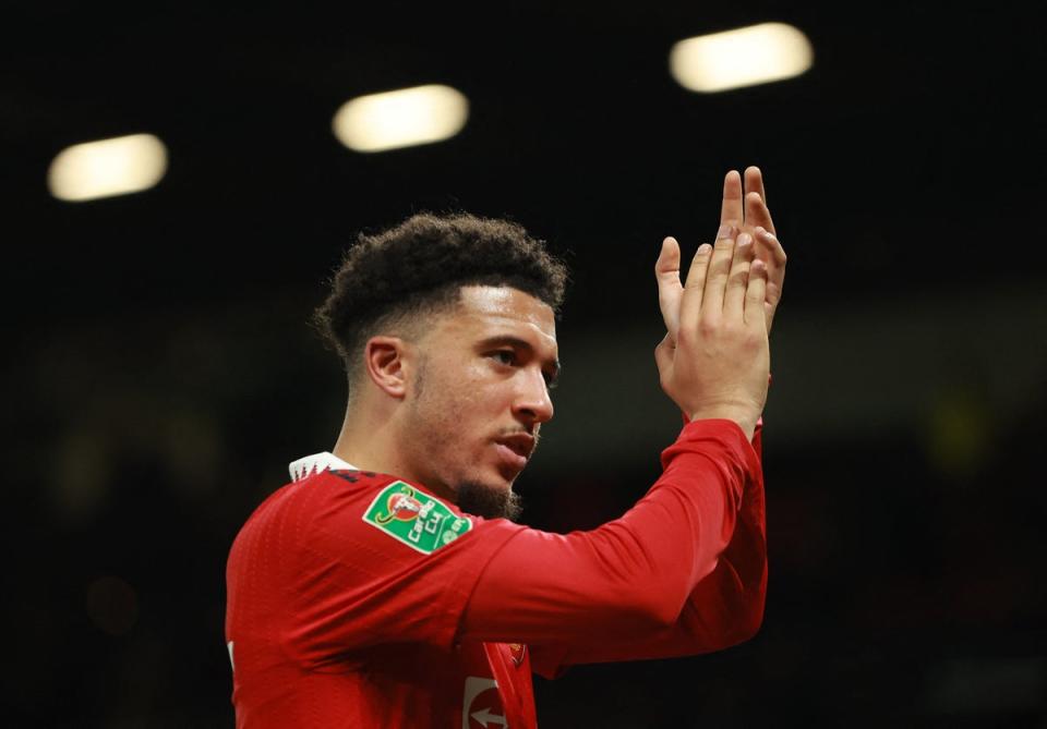 Jadon Sancho applauds the fans at Old Trafford  (REUTERS)