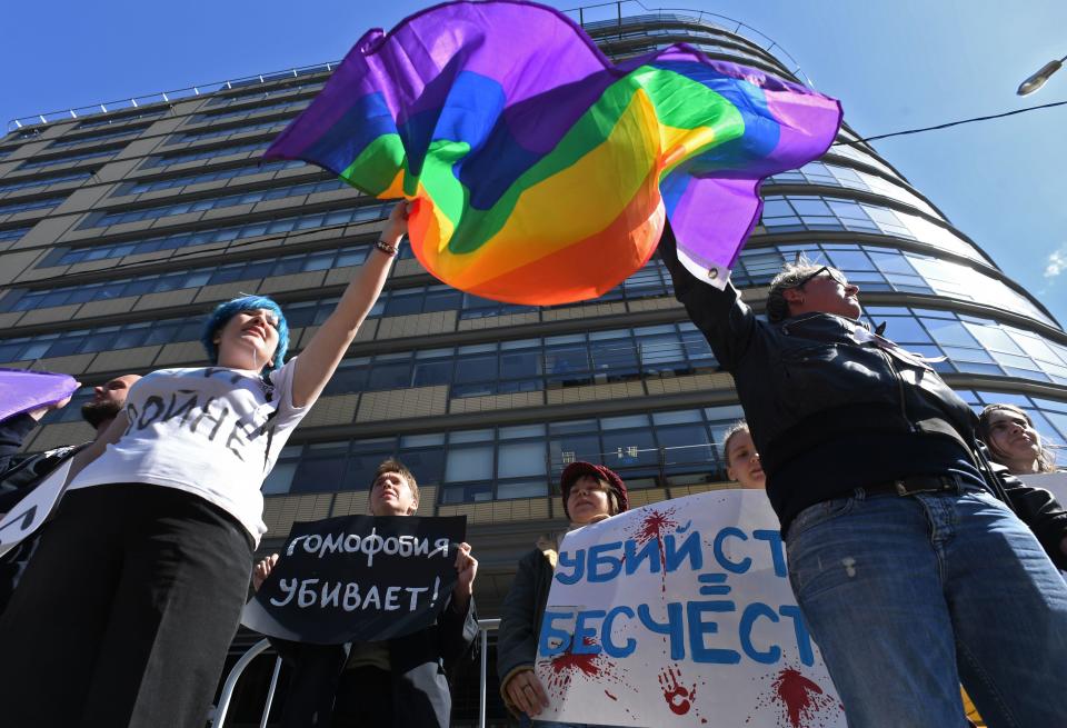 Russian LGBTQ+ rights activists take part in a rally in central Moscow in 2017 to mark five years since the anti-Putin protest on Bolotnaya Square that led to dozens of arrests and injuries on both police and protesters sides. / Credit: KIRILL KUDRYAVTSEV/AFP via Getty Images
