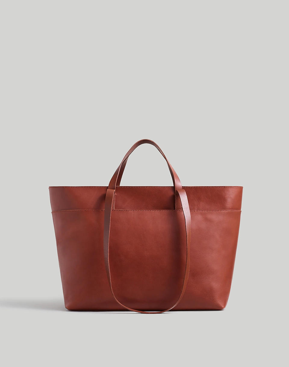 A brown leather Madewell Zip-Top Essential Tote