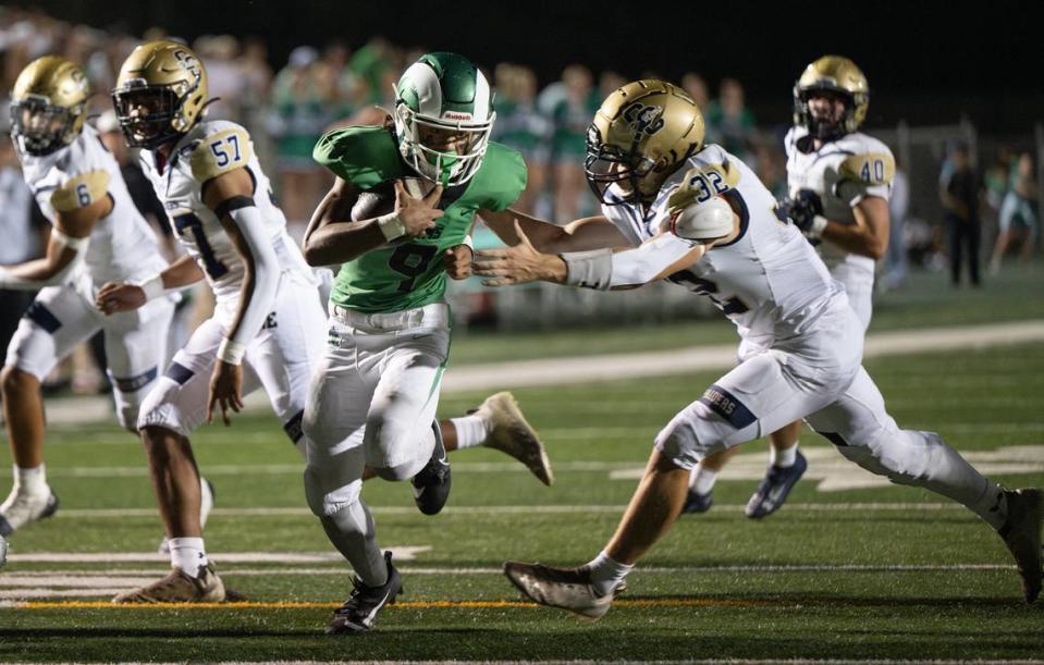 St. Mary’s Samson Hunkin dodges Central Catholic defender Josh Robertson during the game at St. Mary’s High School in Stockton, Calif., Friday, August 25, 2023.