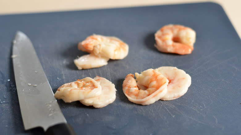 Cutting boiled shrimp