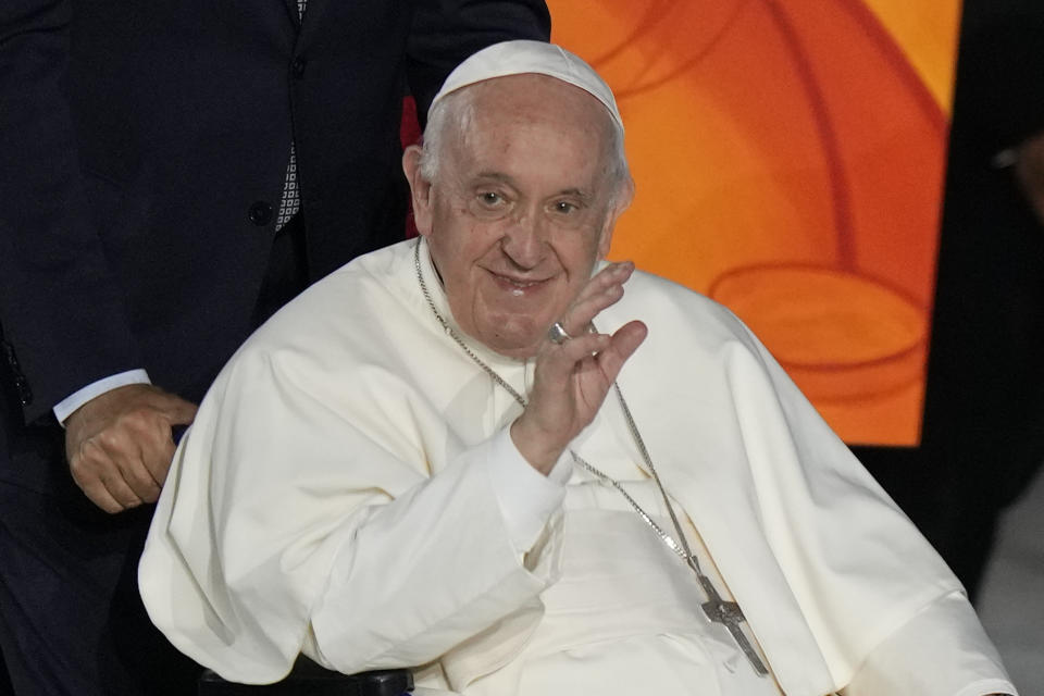 Pope Francis arrives to attend the Festival of Families in the Paul VI Hall at the Vatican, on the first day of the World Meeting of Families, Wednesday, June 22, 2022. (AP Photo/Andrew Medichini)