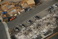 <p>An aerial view of properties destroyed by the Tubbs Fire is seen in Santa Rosa, Calif., Oct. 11, 2017. (Photo: Stephen Lam/Reuters) </p>