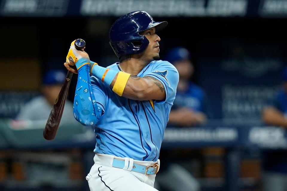 Tampa Bay Rays' Wander Franco watches his two-run double off Toronto Blue Jays relief pitcher Trevor Richards during the fourth inning of a baseball game Thursday, Sept. 22, 2022, in St. Petersburg, Fla. (AP Photo/Chris O'Meara)