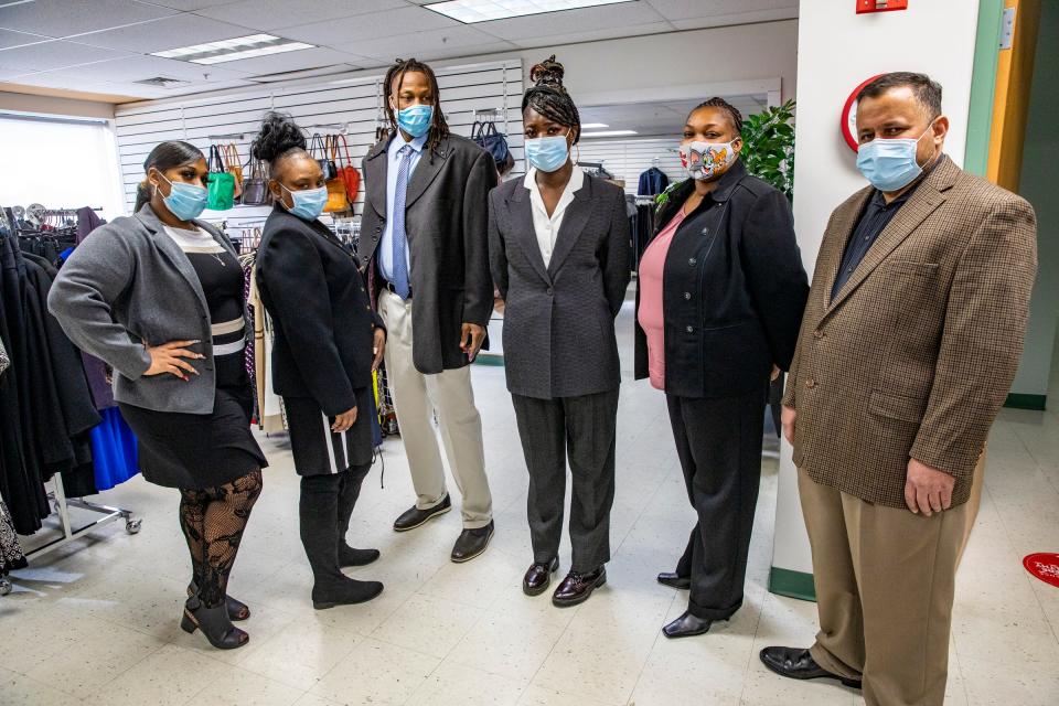 Referrals from Arab Community Center for Economic and Social Services (ACCESS) come in for free, nice business clothes to wear to jobs and job interviews at Jackets for Jobs boutique in Detroit on Wednesday, Dec. 8, 2021.  Jackets for Jobs also provides guidance that helps people obtain sustained employment and rebuild their lives for the long term. During the holiday season, Alison Vaughn believes the best gift thousands of Detroiters can receive is sustainable employment and she is doing her best to help deliver that gift to her fellow Detroiters through her organization Jackets For Jobs.