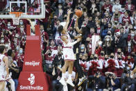 Purdue's Jaden Ivey (23) shoots over Indiana's Trayce Jackson-Davis (23) during the second half of an NCAA college basketball game, Thursday, Jan. 20, 2022, in Bloomington, Ind. (AP Photo/Darron Cummings)