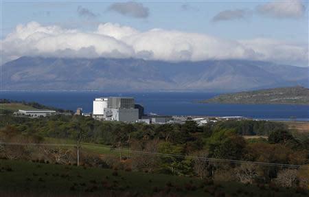 The Isle of Mull is seen behind Hunterston nuclear power station in West Kilbride, Scotland May 15, 2013. REUTERS/Suzanne Plunkett