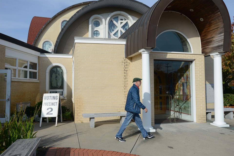 A Barnstable voter heads out into the afternoon sun on Tuesday after casting his ballot at precinct 2 at the St. Georges Greek Orthodox Church in Hyannis. All 13 seats on the Town Council were up for reelection, with six contested races.