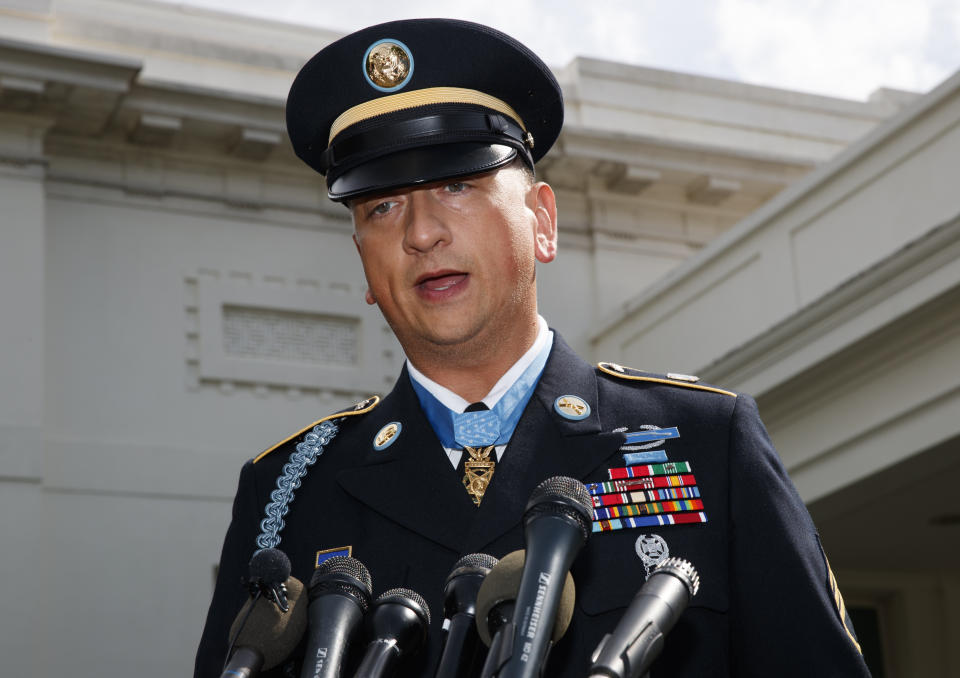 Medal of Honor recipient Army Staff Sgt. David Bellavia speaks to media outside the West Wing of the White House in Washington, Tuesday, June 25, 2019, after receiving the Medal of Honor for conspicuous gallantry while serving in support of Operation Phantom Fury in Fallujah, Iraq. (AP Photo/Carolyn Kaster)