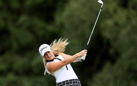 Bronte Law of England plays her third shot on the par 5, 15th - Credit: &nbsp;David Cannon/Getty Images