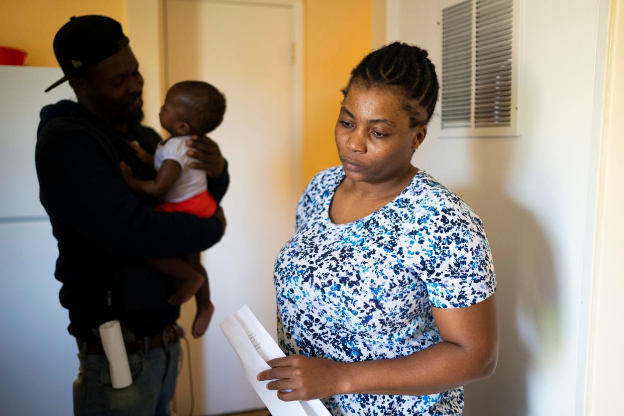 Roseline Paul, lives in a two-bedroom apartment in Colonial Village on Columbus' East Side with her two kids, husband and one other family. They are among more than 850 Haitian immigrants who say they were scammed into moving in to mostly abandoned apartments in Colonial Village, paying $1,200 monthly for two-bedroom apartments without heat and hot water, and some without electricity.