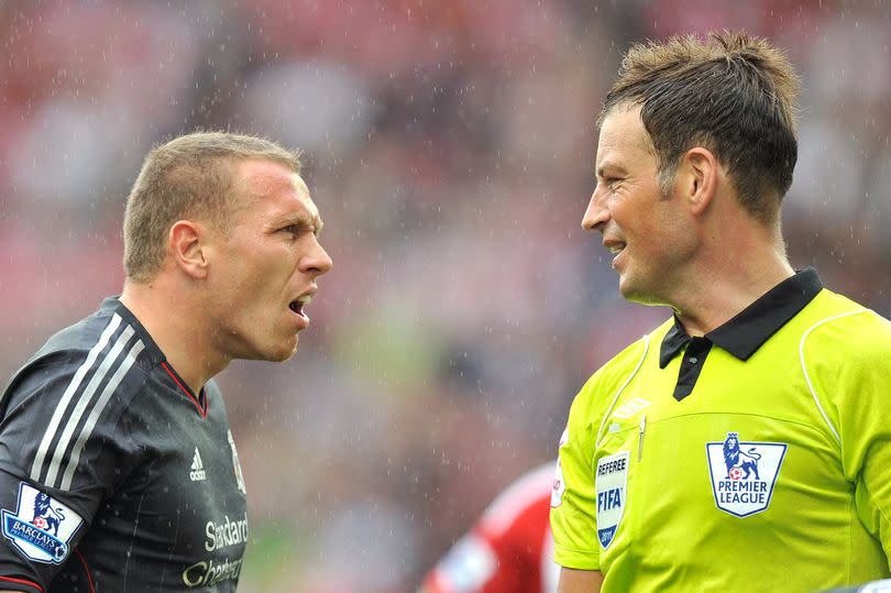 Craig Bellamy [L] caused Mark Clattenburg [R] problems while refereeing