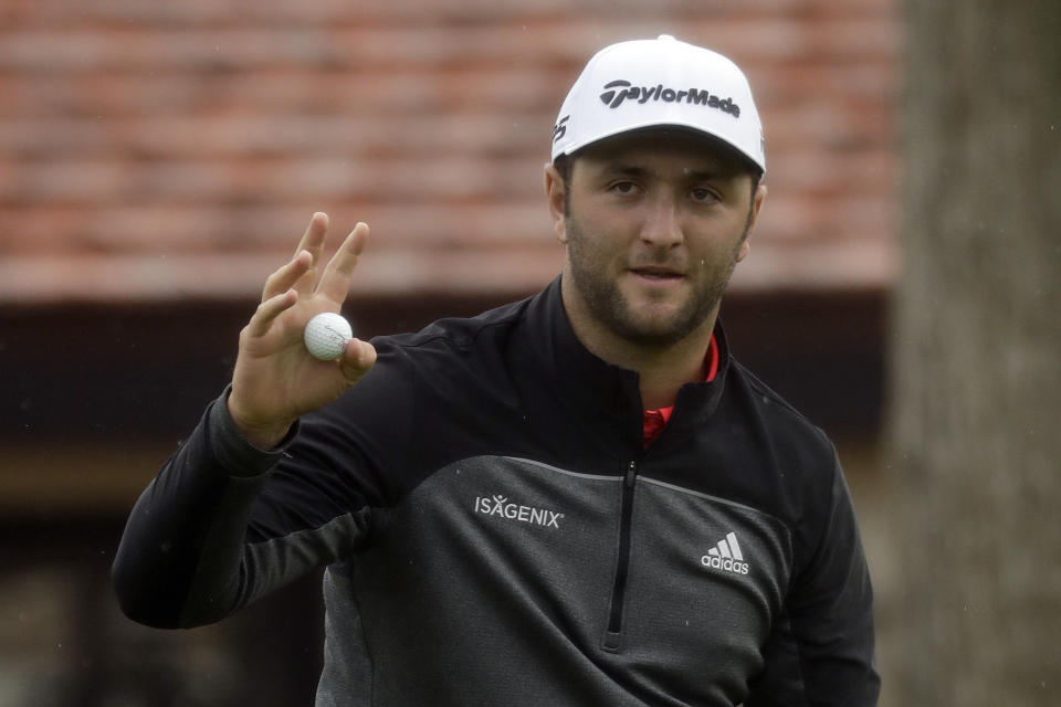 Jon Rahm, of Spain, waves after his birdie putt on the fourth hole during the first round of the Desert Classic golf tournament at La Quinta Country Club, Thursday, Jan. 17, 2019, in La Quinta, Calif. (AP Photo/Chris Carlson)