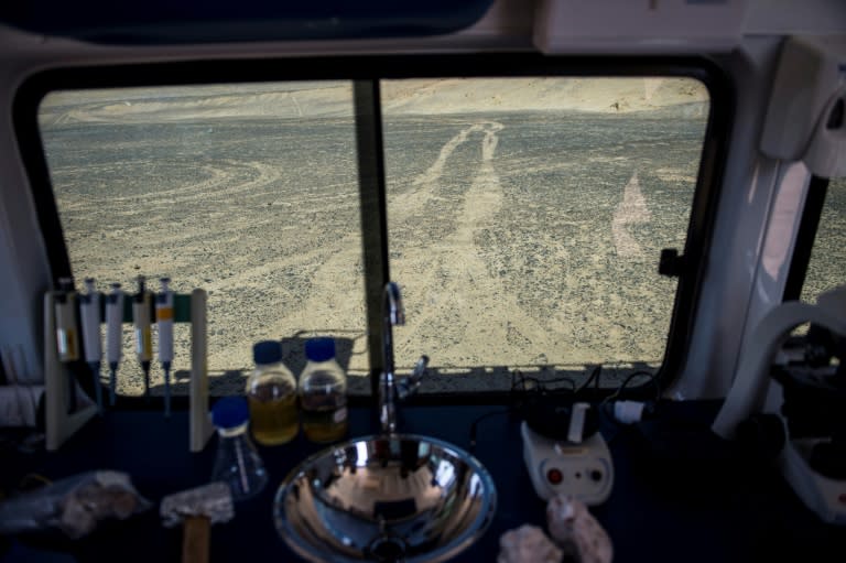 From a mobile research station in Chile's Atacama desert scientists study algae and bacteria that survive on little more than sunlight for clues to possible life on Mars