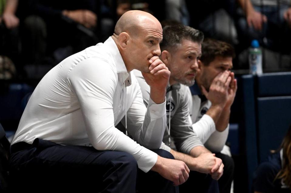 Penn State wrestling coach Cael Sanderson watches Shayne Van Ness during his bout in the National Wrestling Coaches Association All-Star Classic at Rec Hall on Tuesday, Nov. 21, 2023.