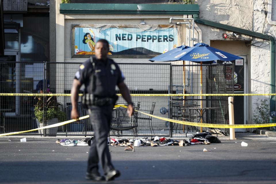 Police pictured at the scene in Dayton (AP)