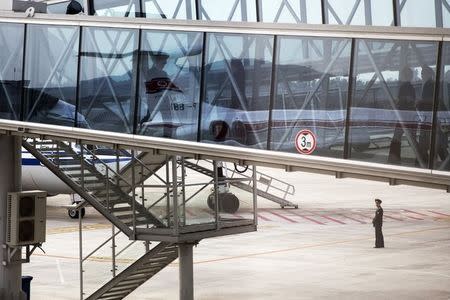 A plane of North Korean airliner Air Koryo is reflected at Pyongyang's airport October 7, 2015. North Korea is getting ready to celebrate the 70th anniversary of the founding of its ruling Workers' Party of Korea on October 10. Picture taken October 7, 2015. REUTERS/Damir Sagolj