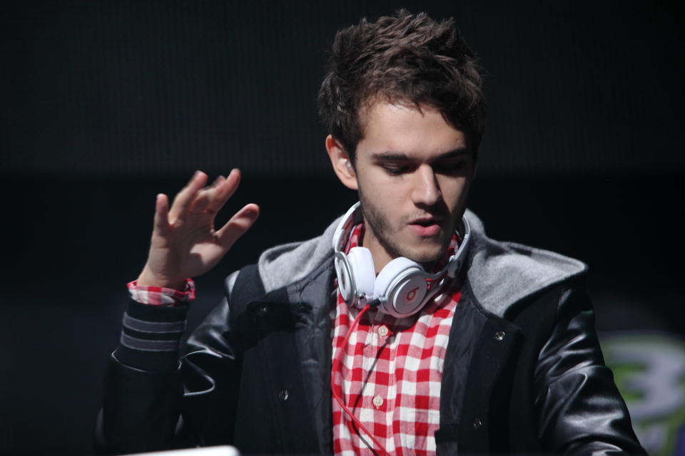 Zedd is a German electronic dance music producer and DJ, but he's also the man behind mainstream radio hits like Justin Bieber's "Beauty and the Beat." He's also Lady Gaga's opening act and has spent a few months laying down tracks for her new album. At 23 years old, this classically trained pianist with a sharp sense of humor is perhaps EDM's best ambassador: An artist with a vision that spans his all-original studio album, "Clarity"; his DJ sets and remixes; and the productions he passes off to pop vocalists. 