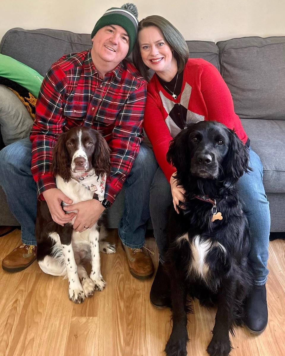 Gabe Whisnant is shown with his wife, Heather, and their dogs, Duncan and Gilda.