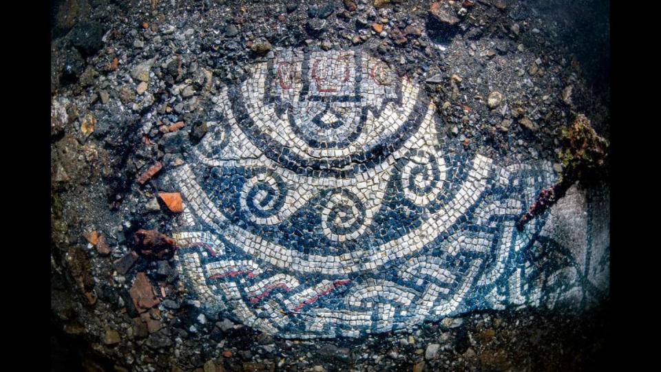 Only a portion of the mosaic has been uncovered from the sand, archaeologists said.