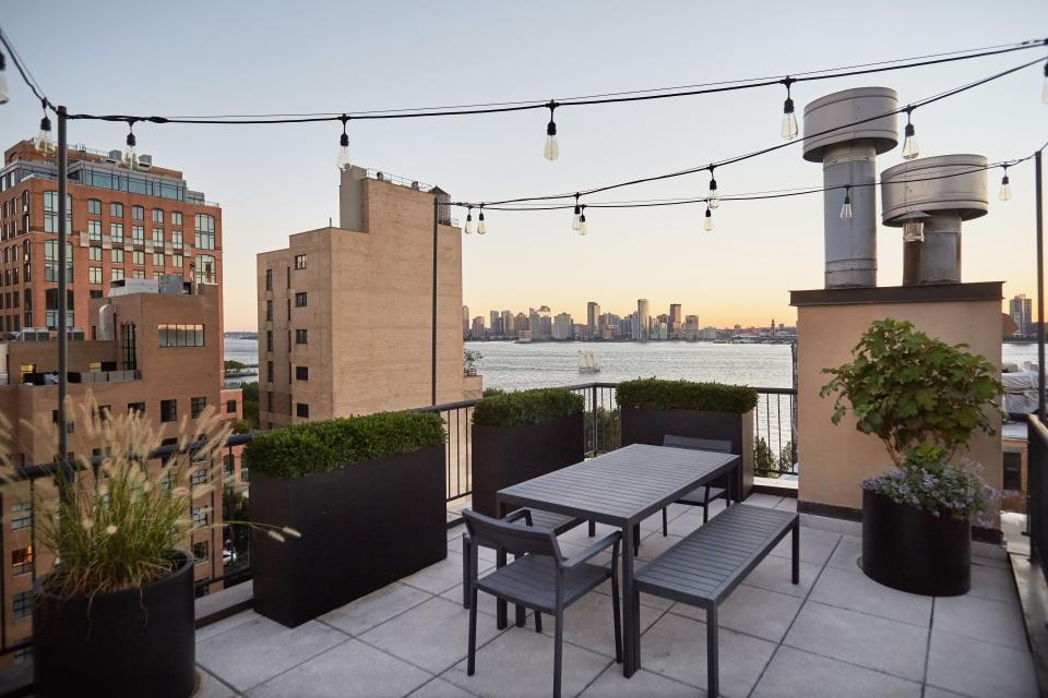 The terrace, a selling point for Blinken, provides views of the Hudson River.