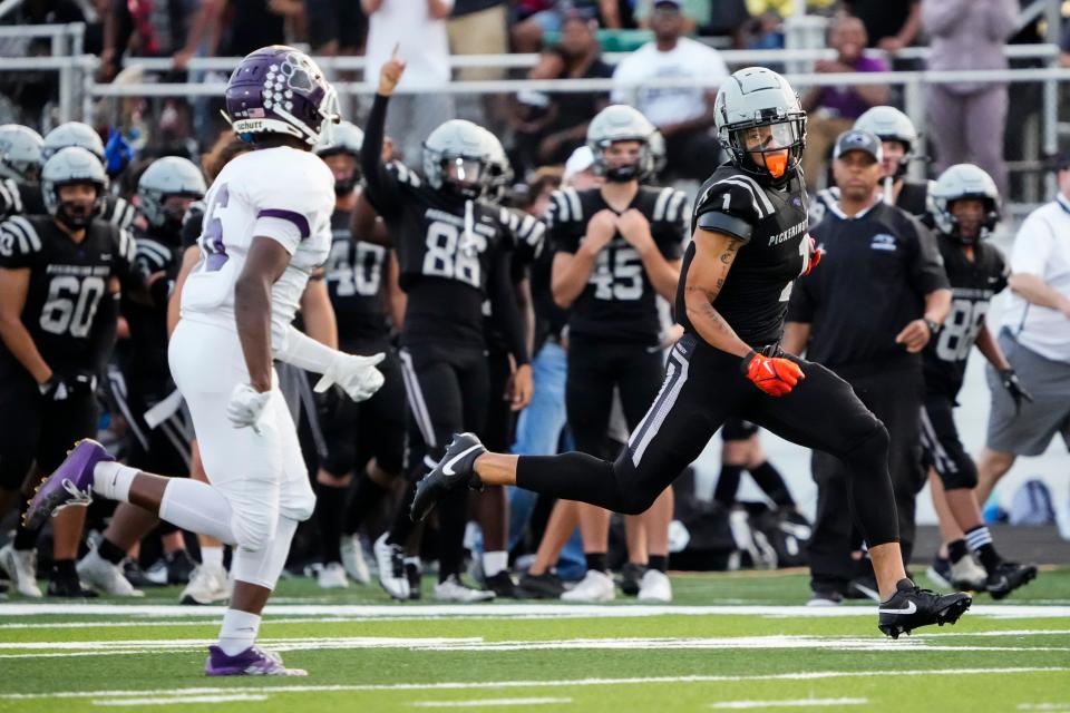 Preston Bowman caught three touchdown passes in Pickerington North's 39-34 win over visiting Pickerington Central on Friday.