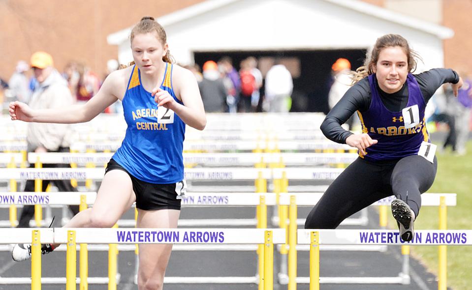 Watertown's Hannah Walburg and Aberdeen Central's Madison Hochstetter head to the finish line in the Class AA girls' 100-meter hurdles during the 2021 Watoma Relays track and field meet in Watertown.. Walburg placed fifth and Hochstetter sixth in the event.