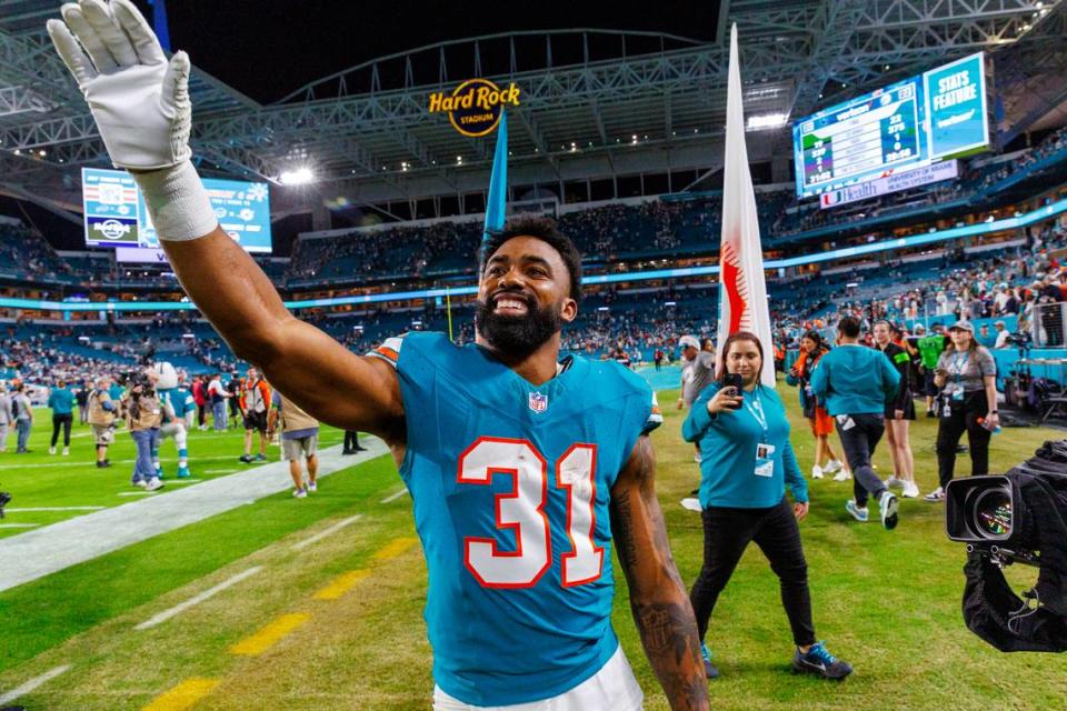 Miami Dolphins running back Raheem Mostert (31) celebrates after the Dolphins 22-20 win over the Cowboys during of an NFL football game at Hard Rock Stadium on Sunday, Dec. 24, 2023 in Miami Gardens, Fl. David Santiago/dsantiago@miamiherald.com