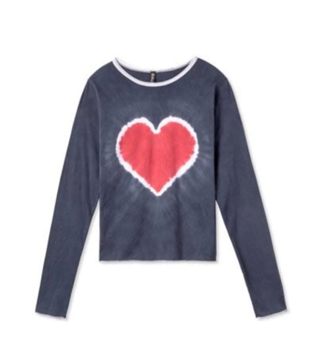 Pretties Tie Dye Heart Baby Tee, $85, <a href="https://prettiesvenice.com/shop/tie-dye-heart?utm_source=IGShopping&utm_medium=Social" rel="nofollow noopener" target="_blank" data-ylk="slk:available here;elm:context_link;itc:0;sec:content-canvas" class="link ">available here</a>.