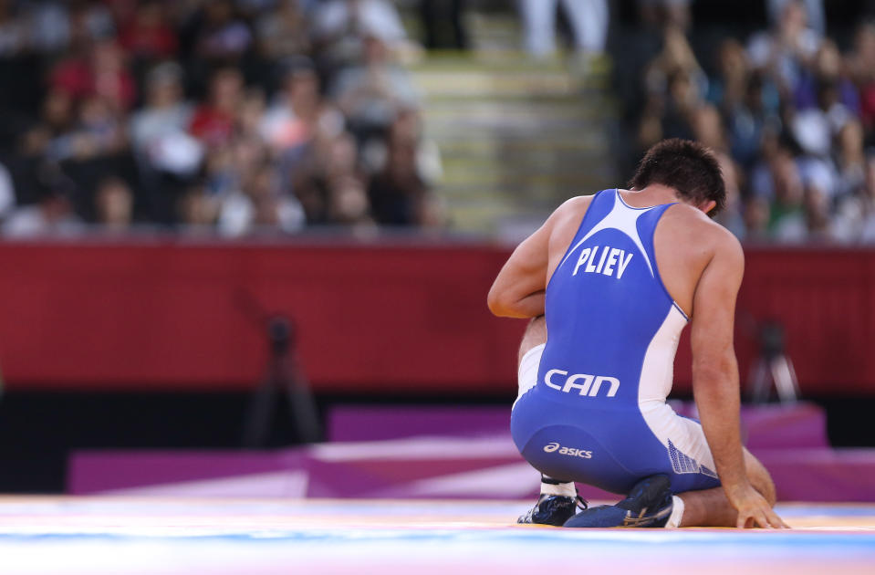 Khetag Pliev lose his repechage match to Russian Kurban Kurbanov.